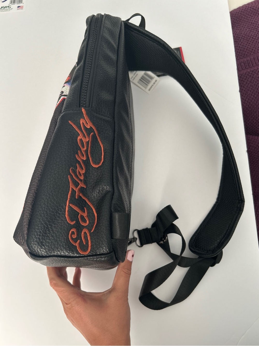 Ed Hardy Black Sling Bag with Multicolor Eagle & Skull Graphic - Picture 6 of 6